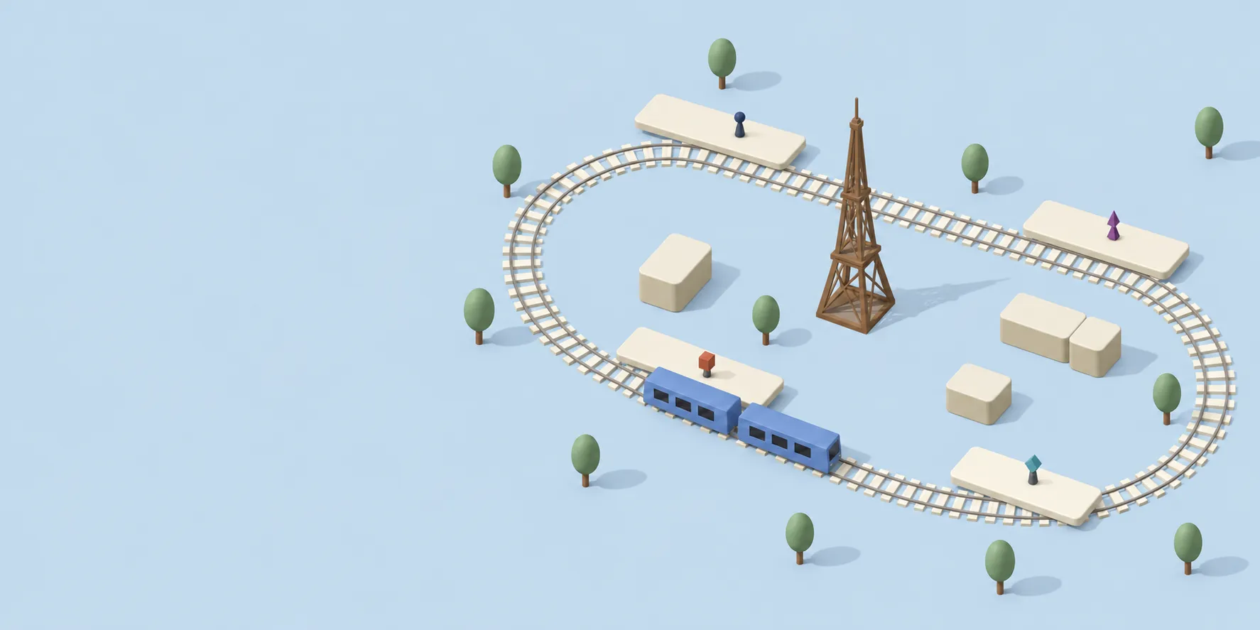 A miniature city loop, with a blue train and ivory platforms among sparse green trees.
